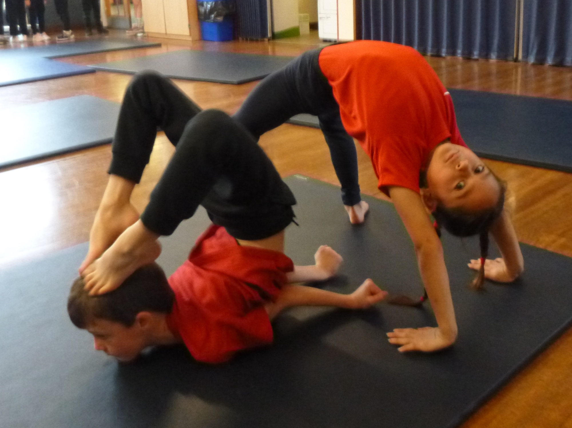 Children performing balances
